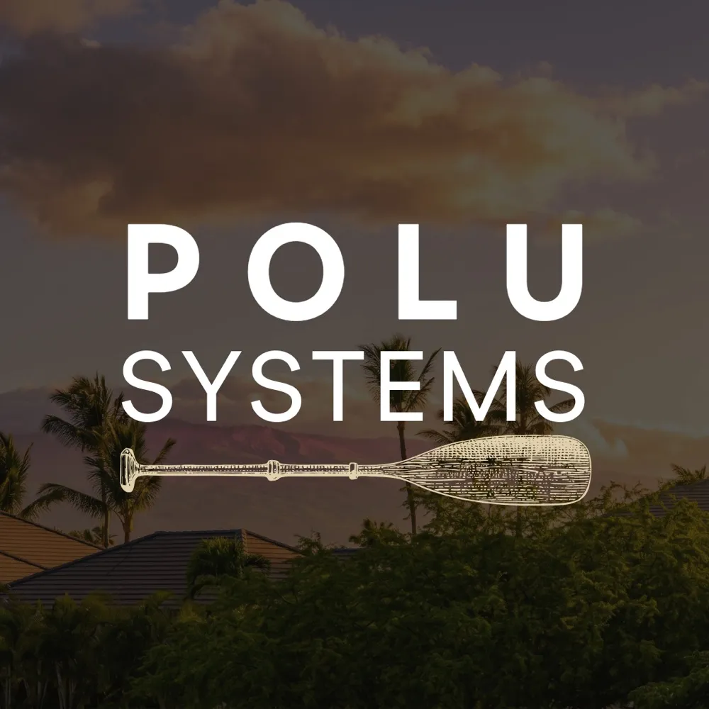 Polu Systems: sunset over island rooftops and palms